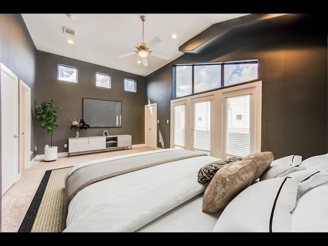 bedroom featuring high vaulted ceiling, carpet flooring, and ceiling fan