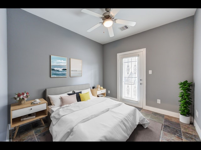 bedroom featuring access to outside and ceiling fan