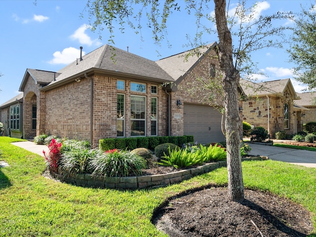 view of home's exterior featuring a lawn and a garage