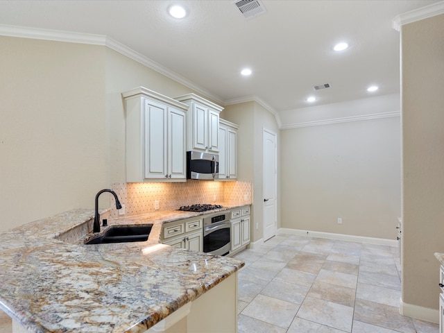 kitchen featuring kitchen peninsula, sink, light stone counters, and stainless steel appliances