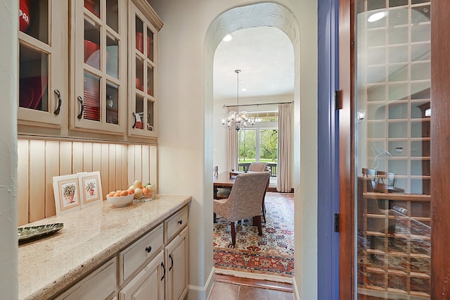 interior space featuring a notable chandelier