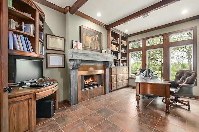 tiled office space featuring crown molding, beam ceiling, a tile fireplace, and built in features