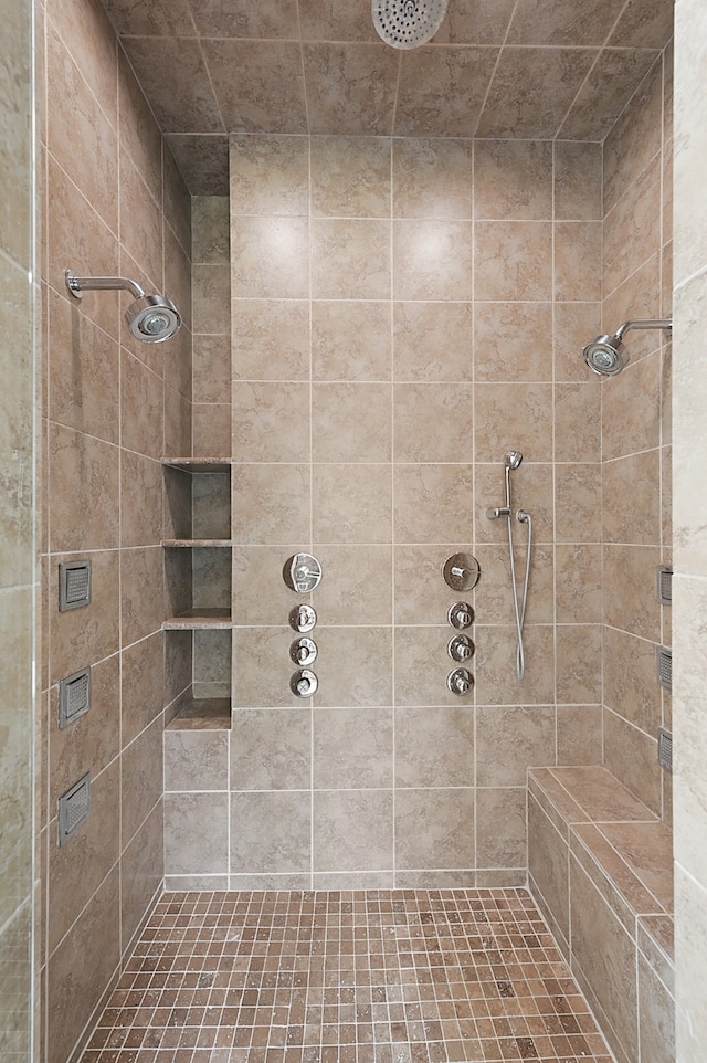 bathroom featuring tiled shower