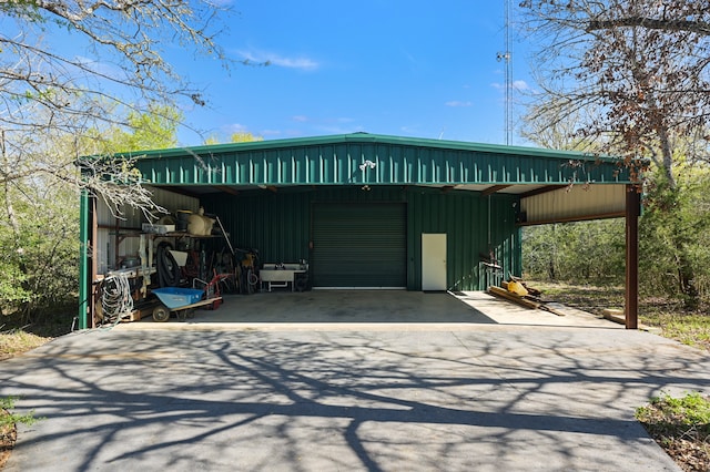 view of outdoor structure with a carport