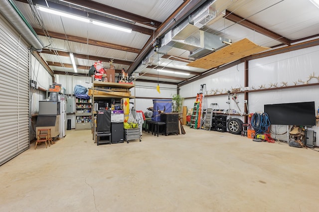 garage with a workshop area