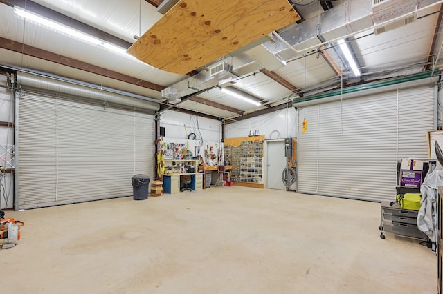 garage with a workshop area