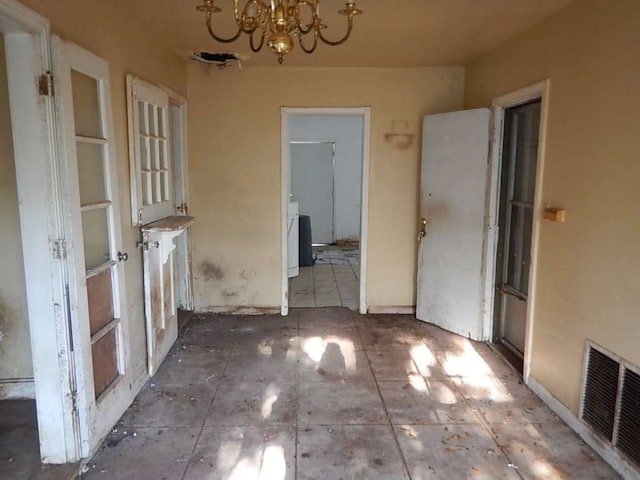 kitchen featuring a notable chandelier