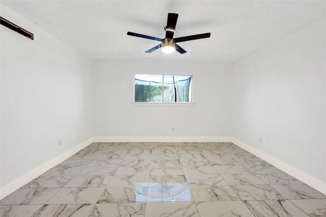 unfurnished room featuring ceiling fan