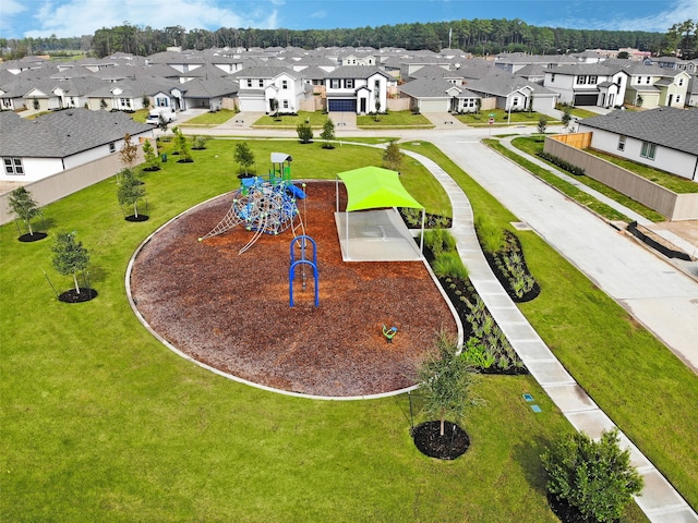 view of property's community with a playground