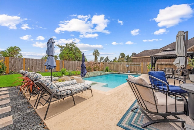 view of swimming pool with a gazebo and a patio