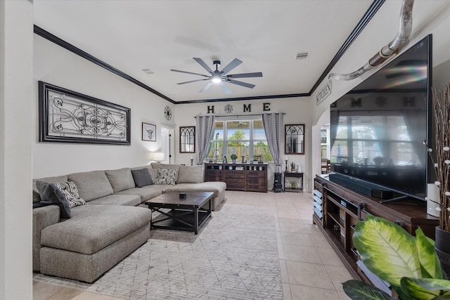 tiled living room with crown molding and ceiling fan