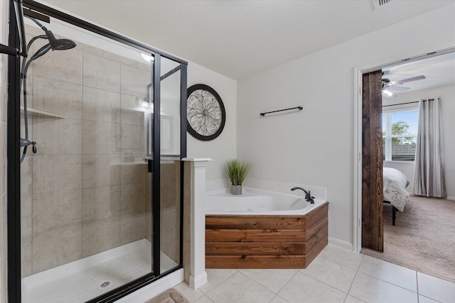 bathroom with separate shower and tub, ceiling fan, and tile patterned flooring