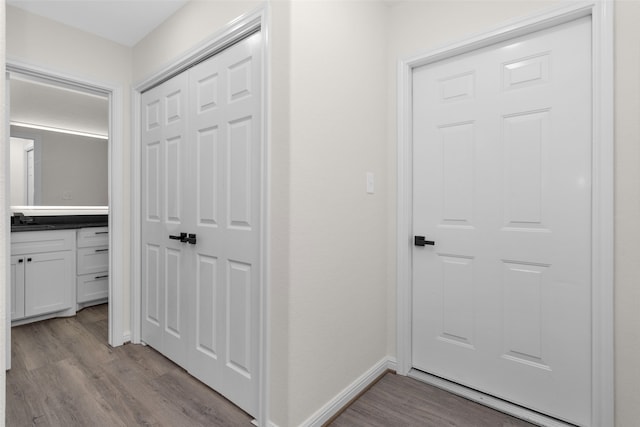 hallway featuring light hardwood / wood-style flooring