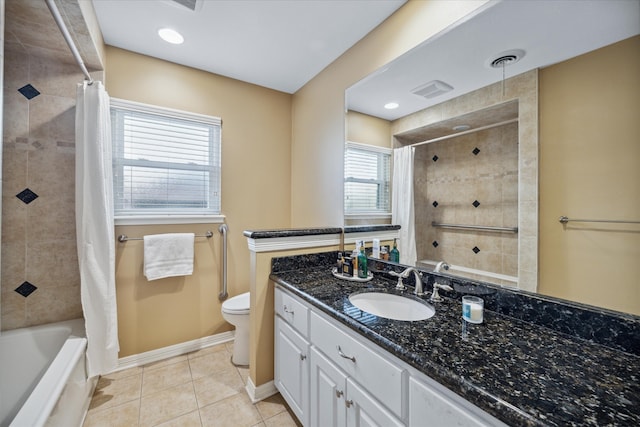 full bathroom featuring vanity, tile patterned flooring, toilet, and shower / bathtub combination with curtain