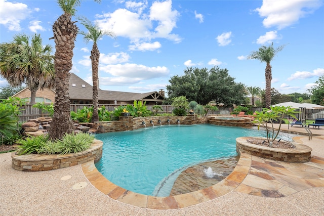 view of swimming pool featuring a patio and pool water feature