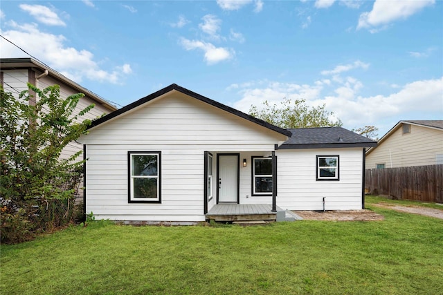 view of front of house with a front lawn