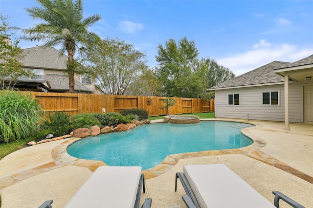 view of pool with an in ground hot tub and a patio