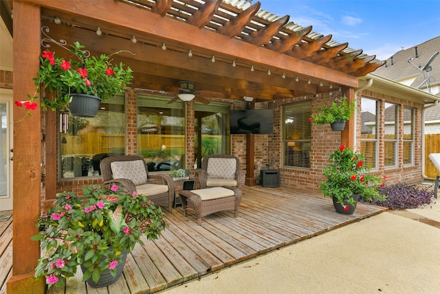 deck with outdoor lounge area and a pergola