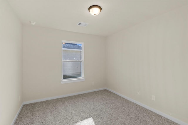 view of carpeted spare room