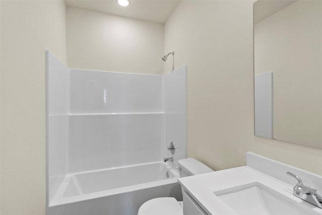 full bathroom featuring shower / bathing tub combination, vanity, and toilet