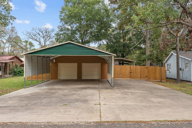 garage featuring a carport