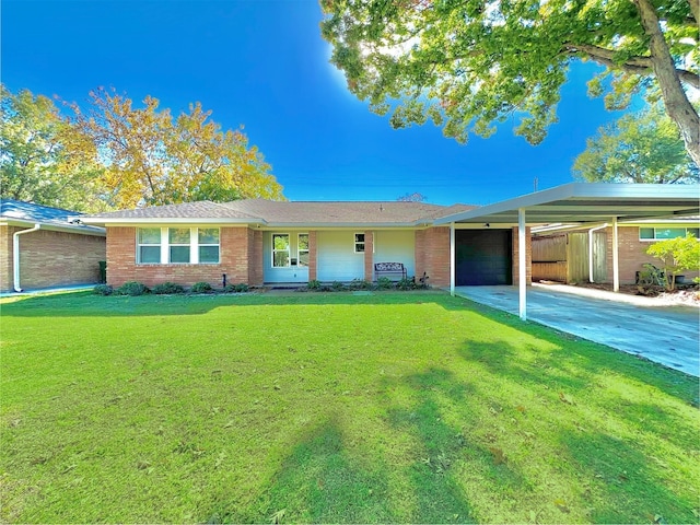 ranch-style home featuring a front lawn and a garage