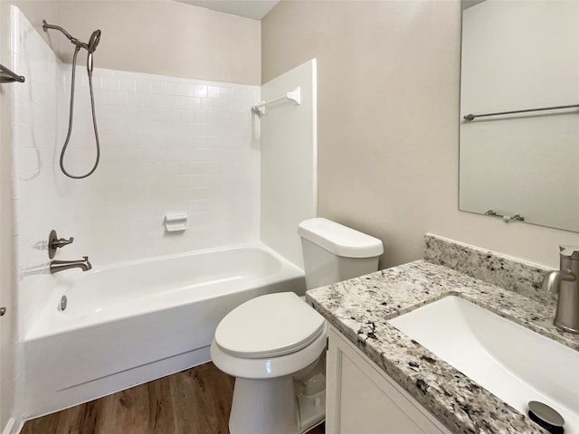 full bathroom with toilet, tub / shower combination, vanity, and wood-type flooring