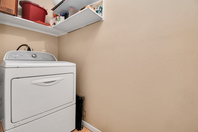 washroom with washer / clothes dryer