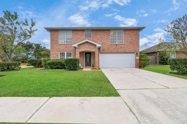 view of front property featuring a garage and a front lawn