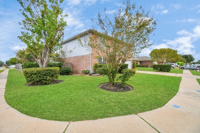 view of property exterior with a yard