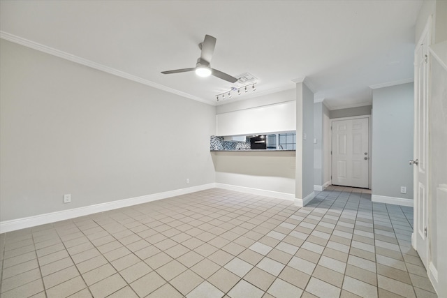 spare room with crown molding, ceiling fan, and light tile patterned floors