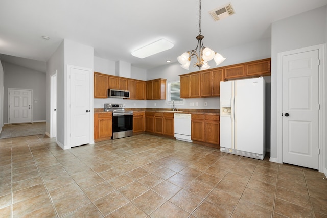 kitchen with sink, hanging light fixtures, stainless steel appliances, light tile patterned floors, and a chandelier