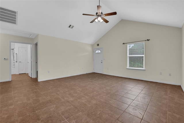 unfurnished living room featuring light tile patterned floors, high vaulted ceiling, and ceiling fan