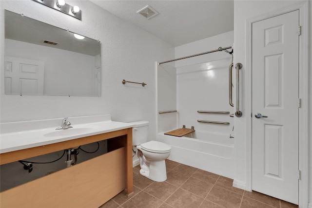 full bathroom featuring toilet, tile patterned flooring, vanity, and shower / bathtub combination