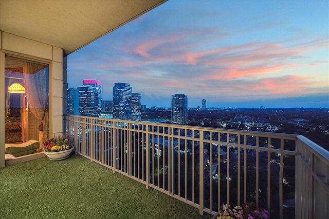 view of balcony at dusk