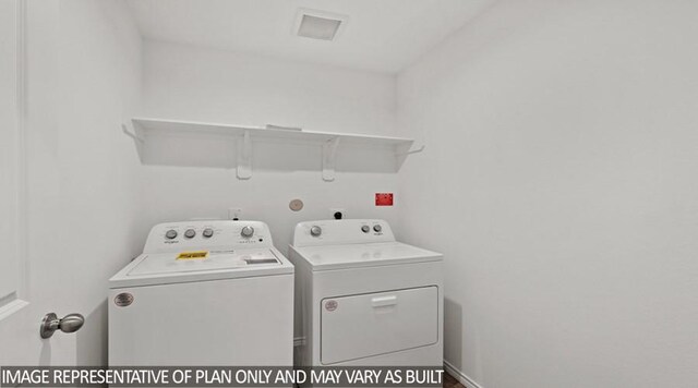 washroom with washer and clothes dryer