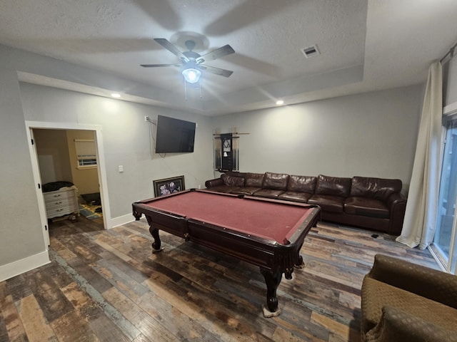 playroom with pool table, a textured ceiling, ceiling fan, and dark hardwood / wood-style floors