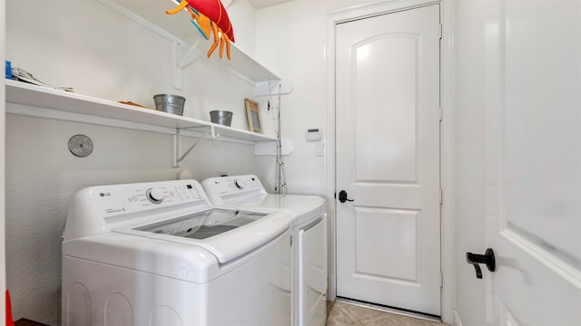 laundry area featuring washer and clothes dryer