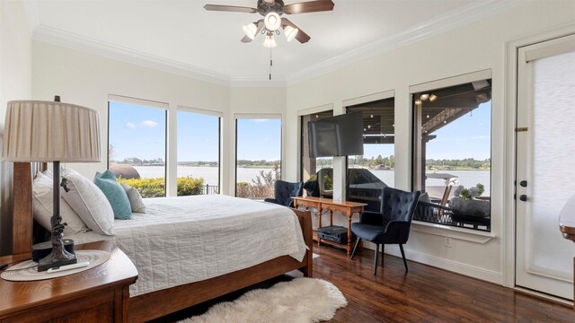 bedroom featuring ceiling fan, crown molding, and dark hardwood / wood-style floors