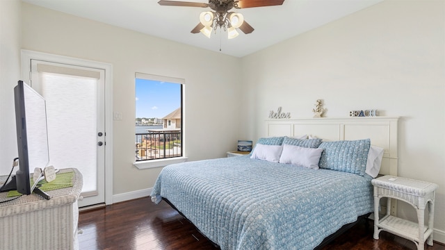 bedroom featuring ceiling fan and dark hardwood / wood-style flooring