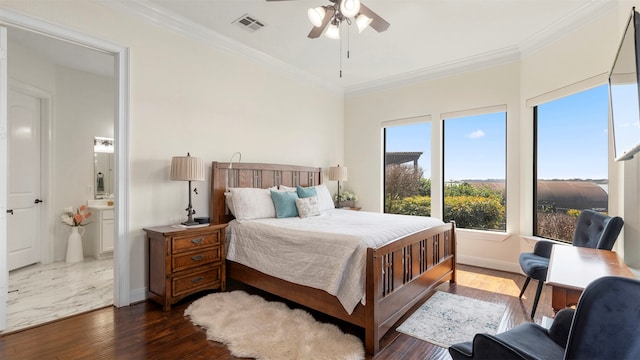 bedroom featuring ceiling fan, crown molding, ensuite bathroom, and dark hardwood / wood-style floors