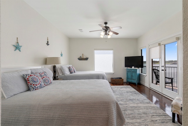 bedroom with ceiling fan, access to outside, and dark hardwood / wood-style floors