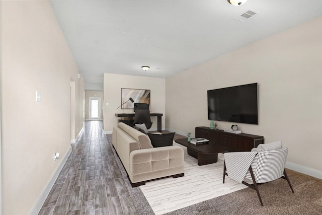 living room with hardwood / wood-style flooring