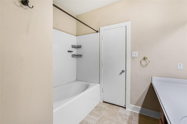 bathroom featuring vanity and shower / tub combination