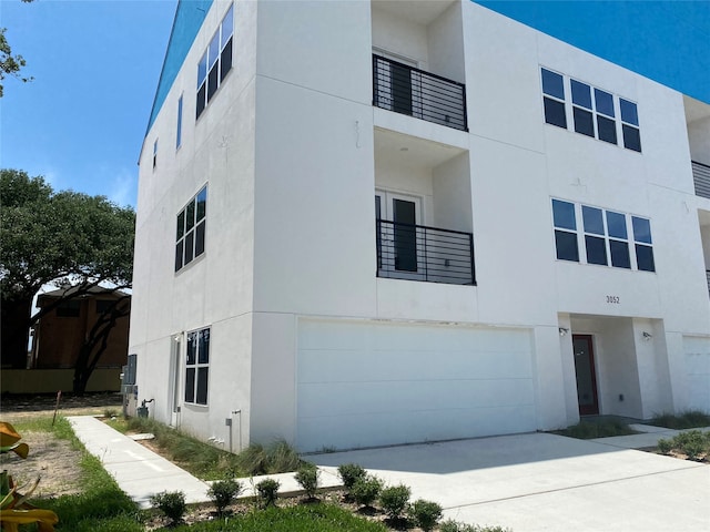 view of building exterior featuring a garage