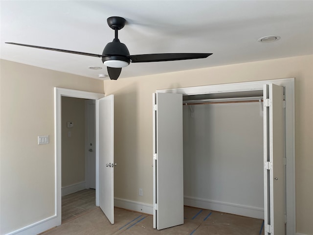 unfurnished bedroom with a closet and ceiling fan