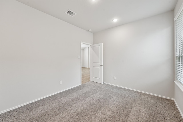 view of carpeted spare room