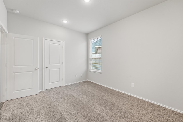 unfurnished bedroom featuring carpet flooring