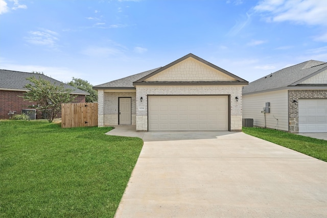 ranch-style home with a front lawn and a garage