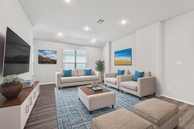 living room featuring dark hardwood / wood-style flooring